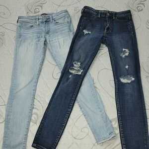 2 for $13.00 American Eagle Outfitters Light and Dark Blue Distressed Jeans